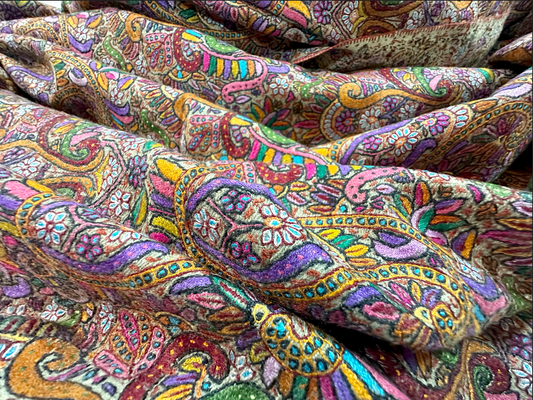 close up of Sozni Gent Shawl more than 4 years of embroidery  in 42 colors. masterpiece by vonoz cashmere